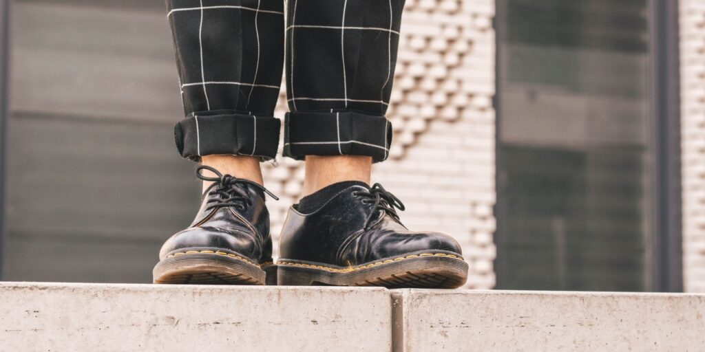 Low ankle docs paired with checkered pants