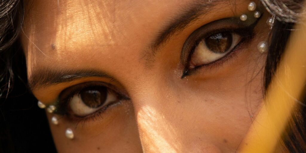 a girls eyes with little rhinestones on them any eyeliner from Ulta