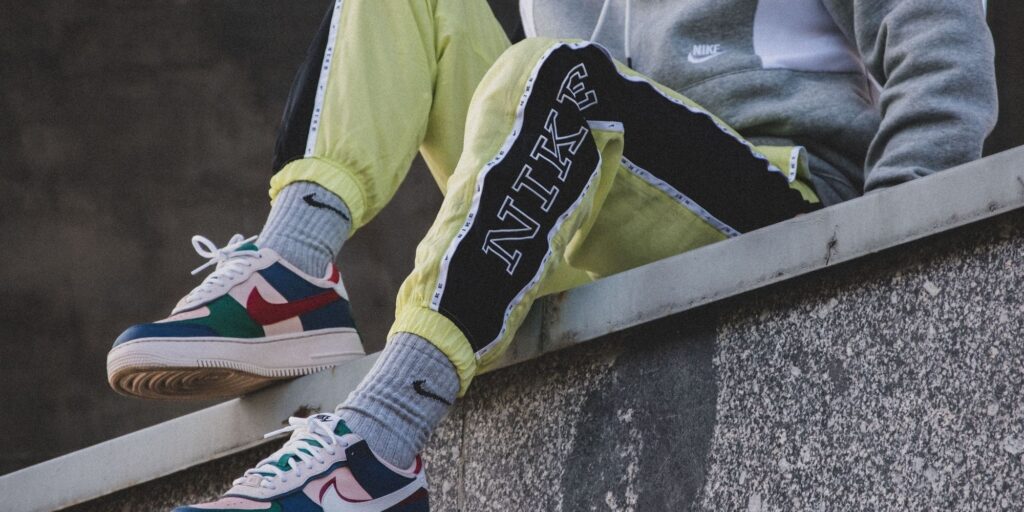 Yellow nike sweat pants with nike sneakers