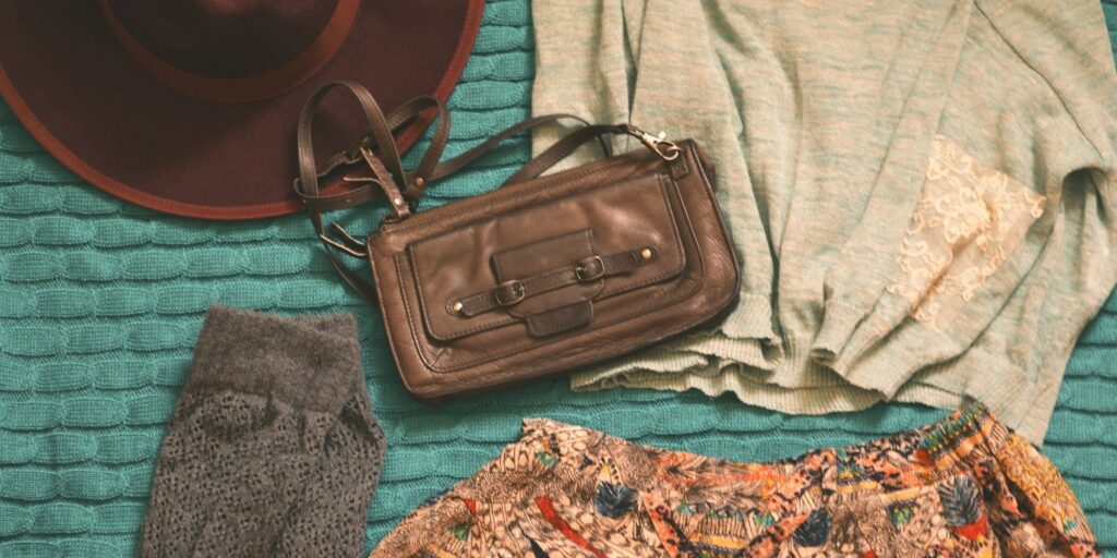 Selection of thrifted vinted clothes, a bag and a hat